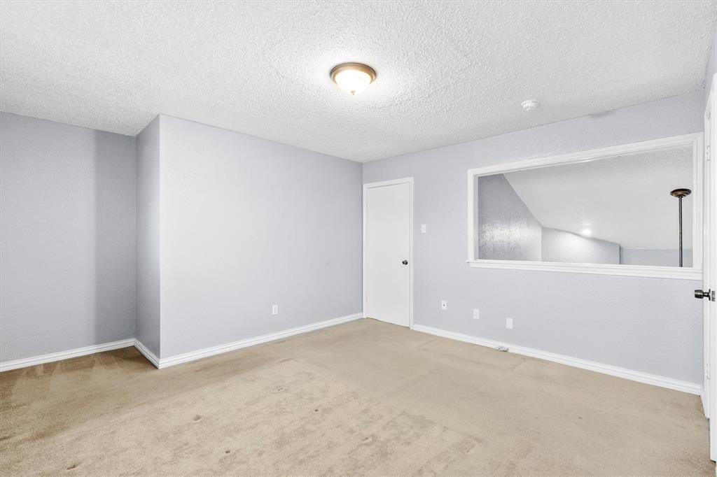 5840 Spring Valley Road, Unit 912 Dallas, TX 75254 - Photo 9 of 33 a view of an empty room