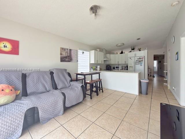 16955 Southwest 142nd Place Miami, FL 33177 - Photo 11 of 29 a living room with furniture and kitchen view