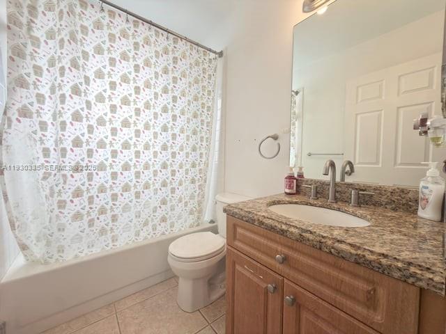 16955 Southwest 142nd Place Miami, FL 33177 - Photo 13 of 29 a bathroom with a granite countertop sink mirror vanity and toilet