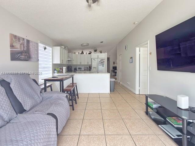16955 Southwest 142nd Place Miami, FL 33177 - Photo 14 of 29 a living room with furniture and a table