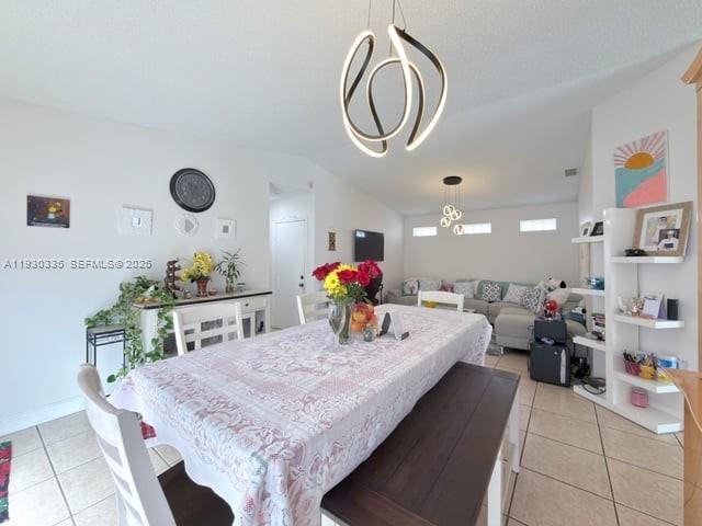 16955 Southwest 142nd Place Miami, FL 33177 - Photo 21 of 29 a living room with furniture chandelier and a mirror