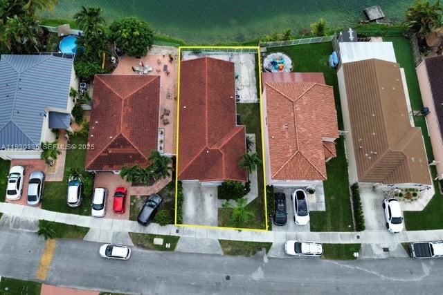 16955 Southwest 142nd Place Miami, FL 33177 - Photo 3 of 29 an aerial view of residential houses with outdoor space