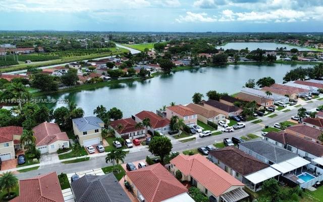 16955 Southwest 142nd Place Miami, FL 33177 - Photo 7 of 29 an aerial view of a city with lake view