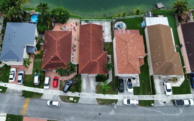 16955 Southwest 142nd Place Miami, FL 33177 - Photo 8 of 29 an aerial view of multiple houses with a street