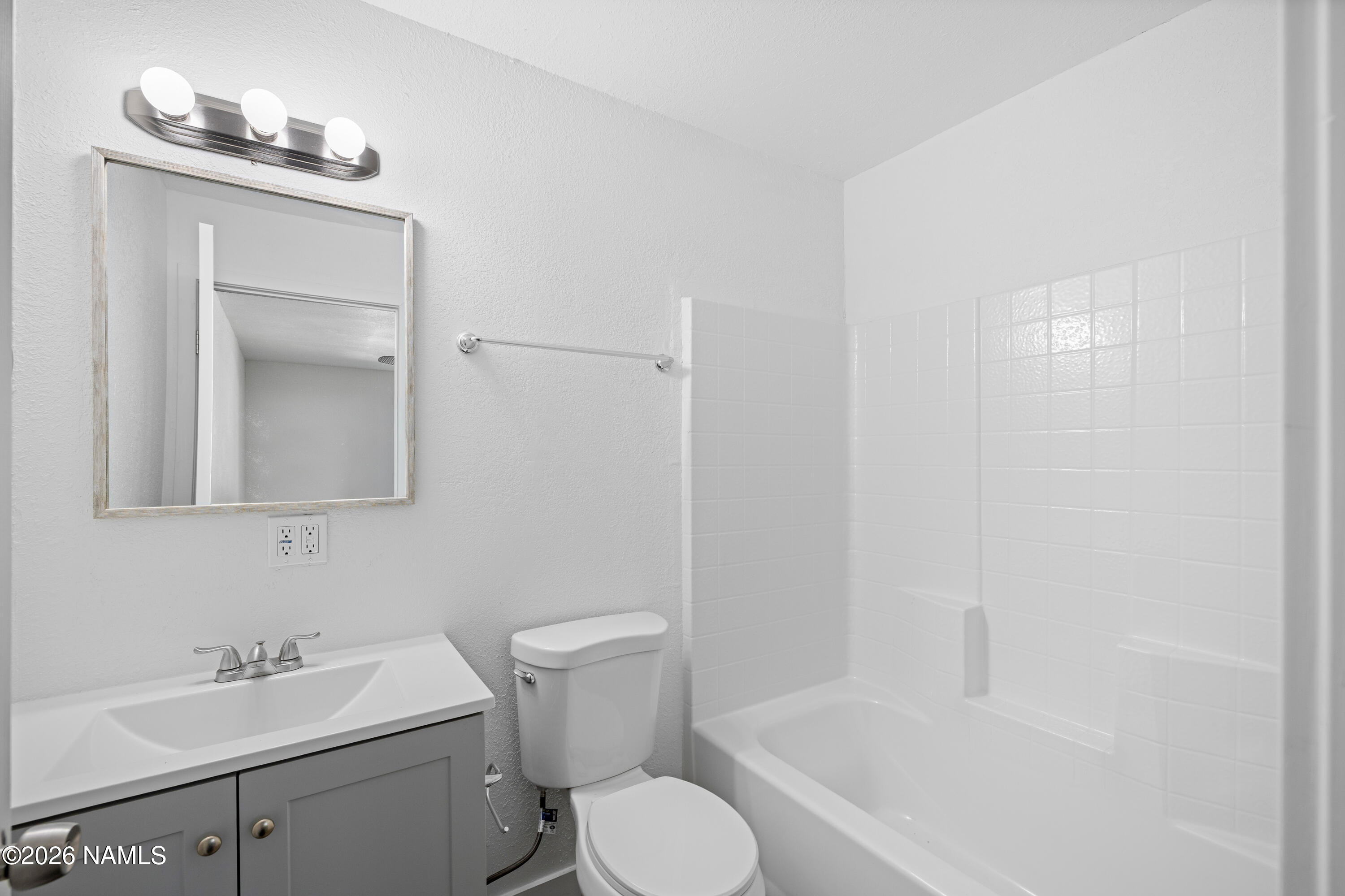 874 Oneida Flagstaff, AZ 86005 - Photo 23 of 30 a bathroom with a sink toilet and tub
