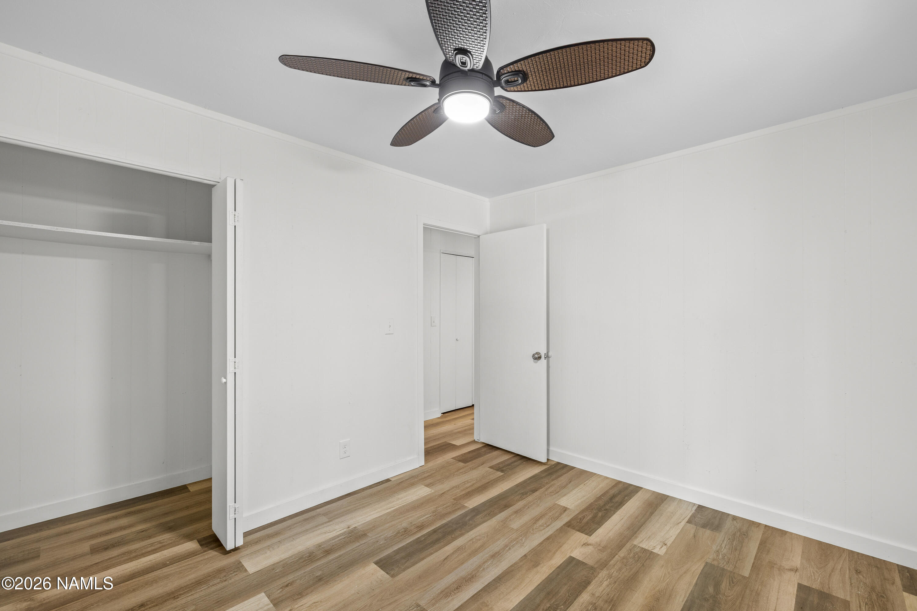 874 Oneida Flagstaff, AZ 86005 - Photo 28 of 30 a view of empty room with ceiling fan