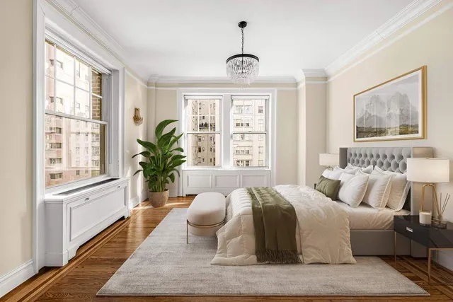 a large bathroom with a tub a sink and a large window