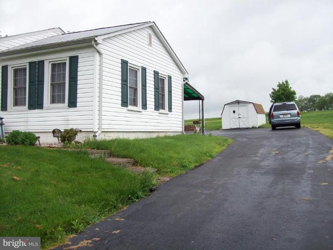 671 Harrington Road Rising Sun, MD 21911 - Photo 2 of 12 hardtop driveway, open field in the back
