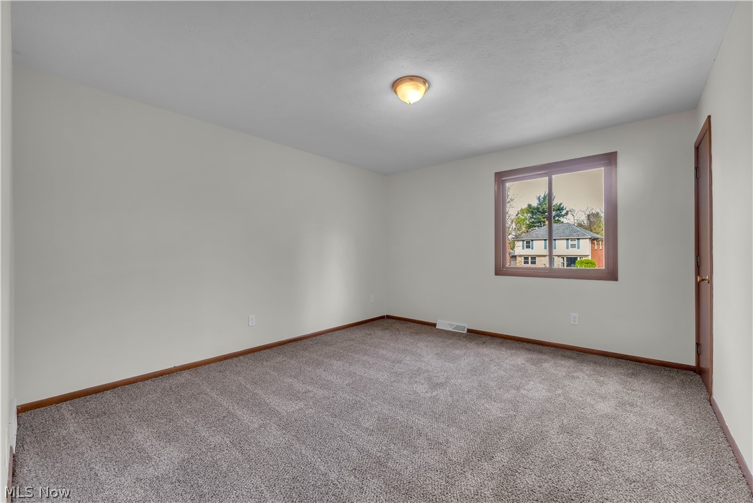 2540 Charney Road University Heights, OH 44118 - Photo 24 of 44 Neutral-toned wall paint throughout