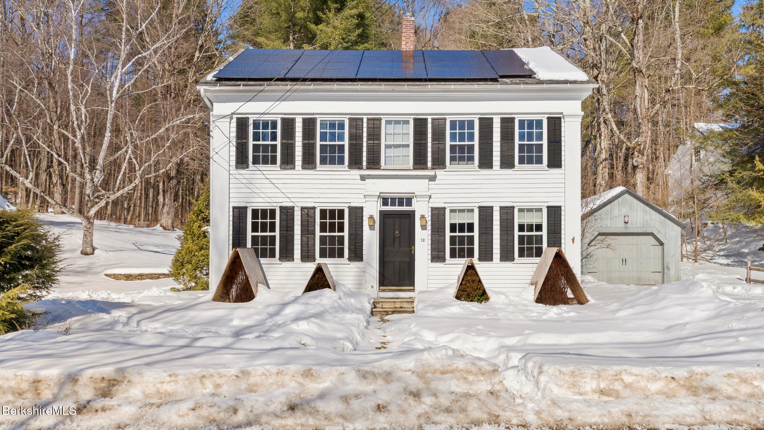 a view of a building with a yard