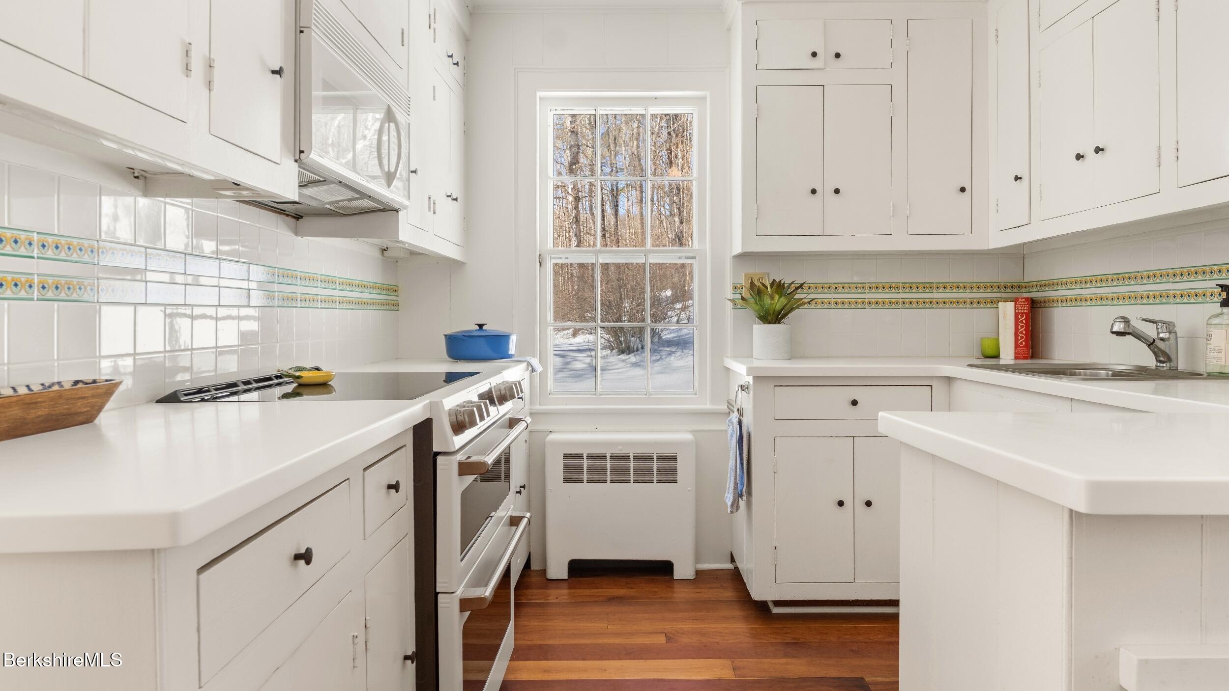 12 Alford Center Road Alford, MA 01266 - Photo 11 of 46 a kitchen with a sink stove and cabinets