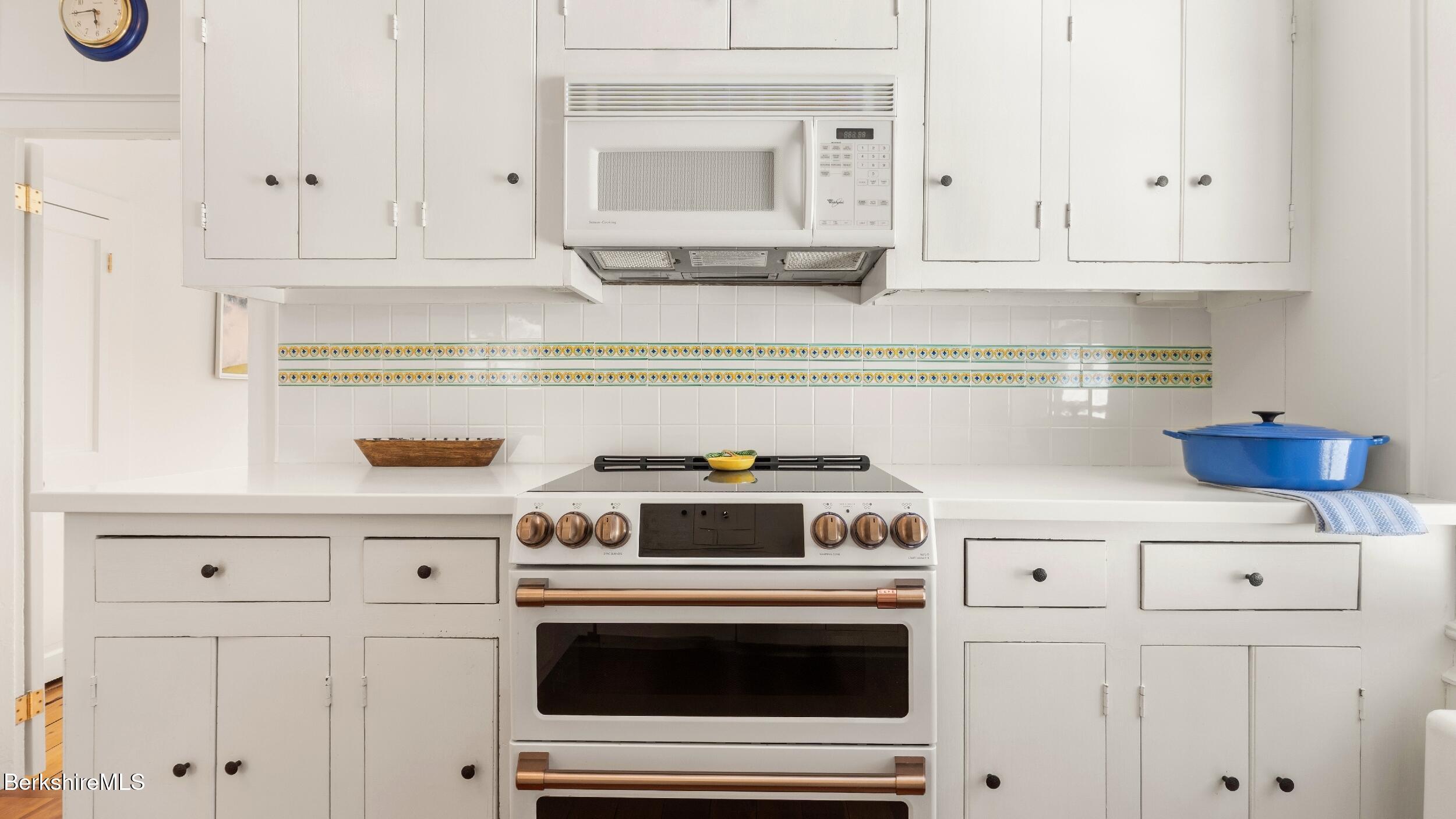12 Alford Center Road Alford, MA 01266 - Photo 12 of 46 a kitchen with white cabinets and appliances