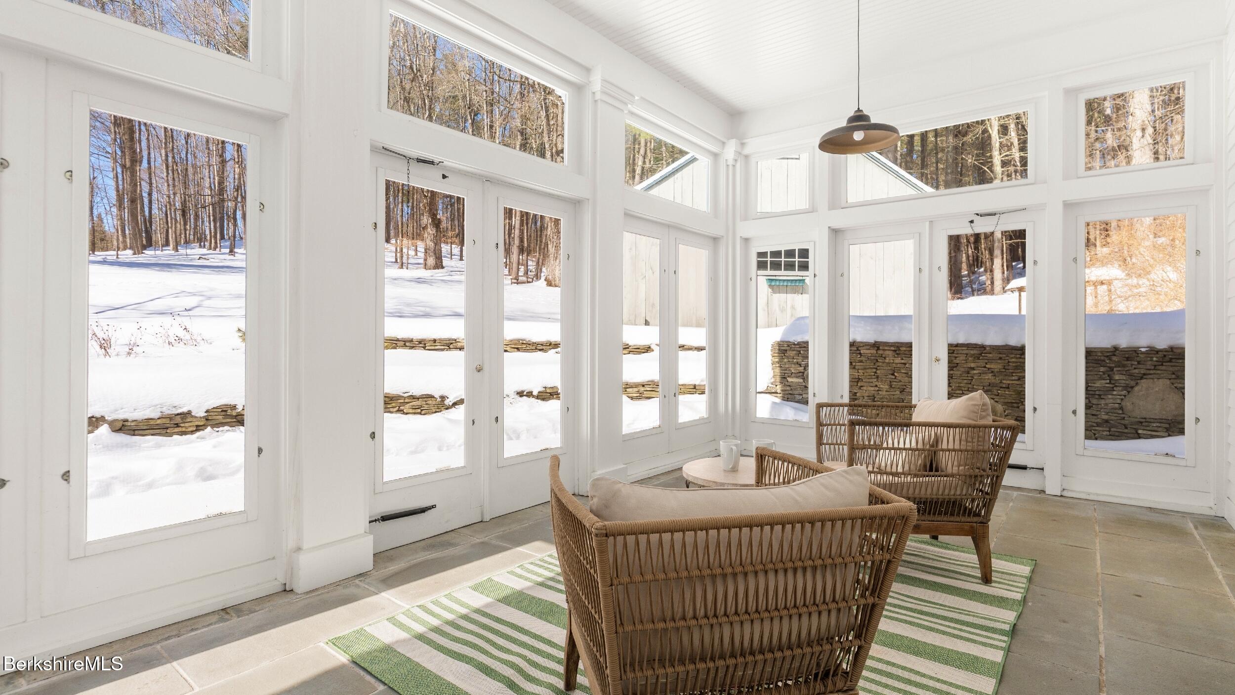 12 Alford Center Road Alford, MA 01266 - Photo 30 of 46 a living room with furniture and floor to ceiling windows