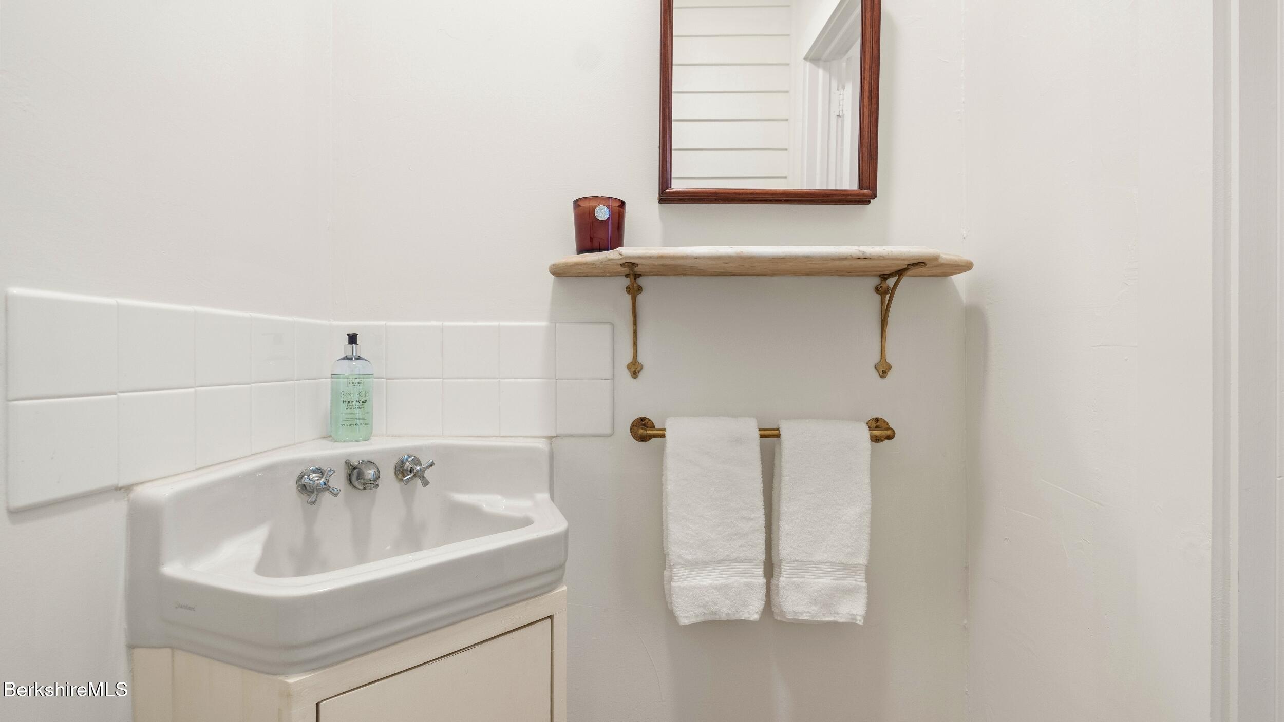 12 Alford Center Road Alford, MA 01266 - Photo 31 of 46 a bathroom with a sink and a mirror