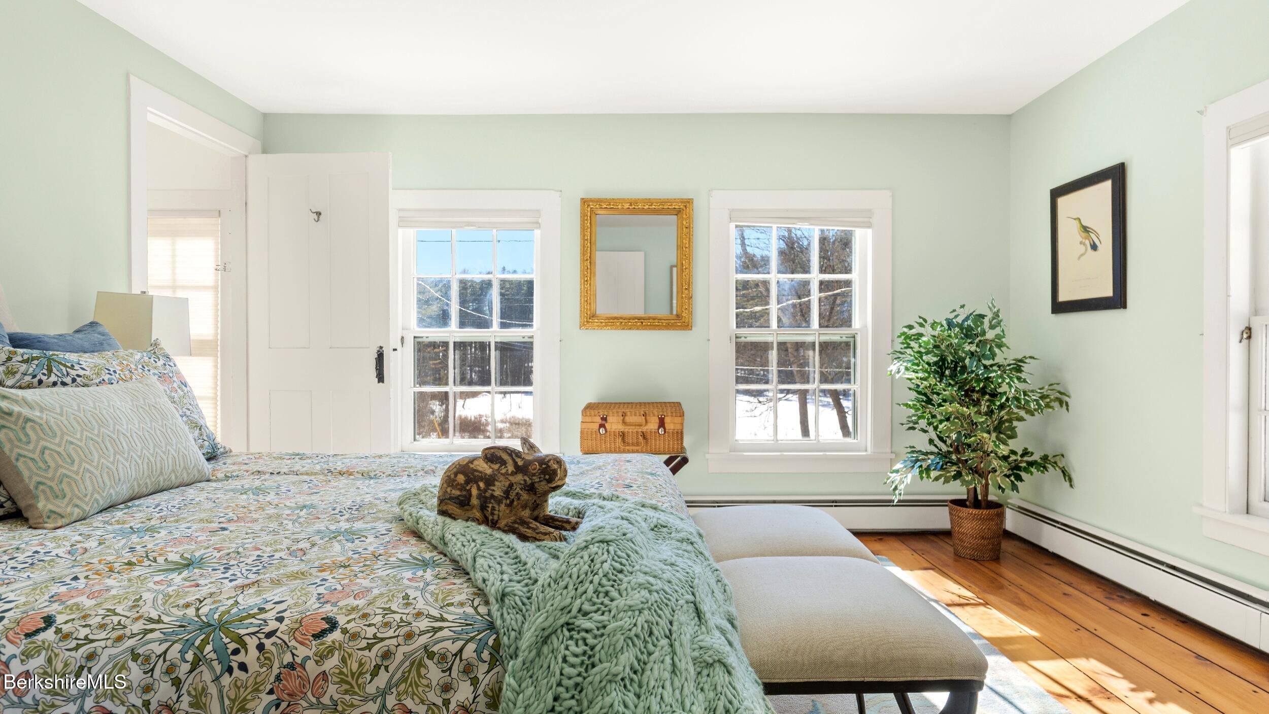 12 Alford Center Road Alford, MA 01266 - Photo 32 of 46 a bedroom with a bed and wooden floor