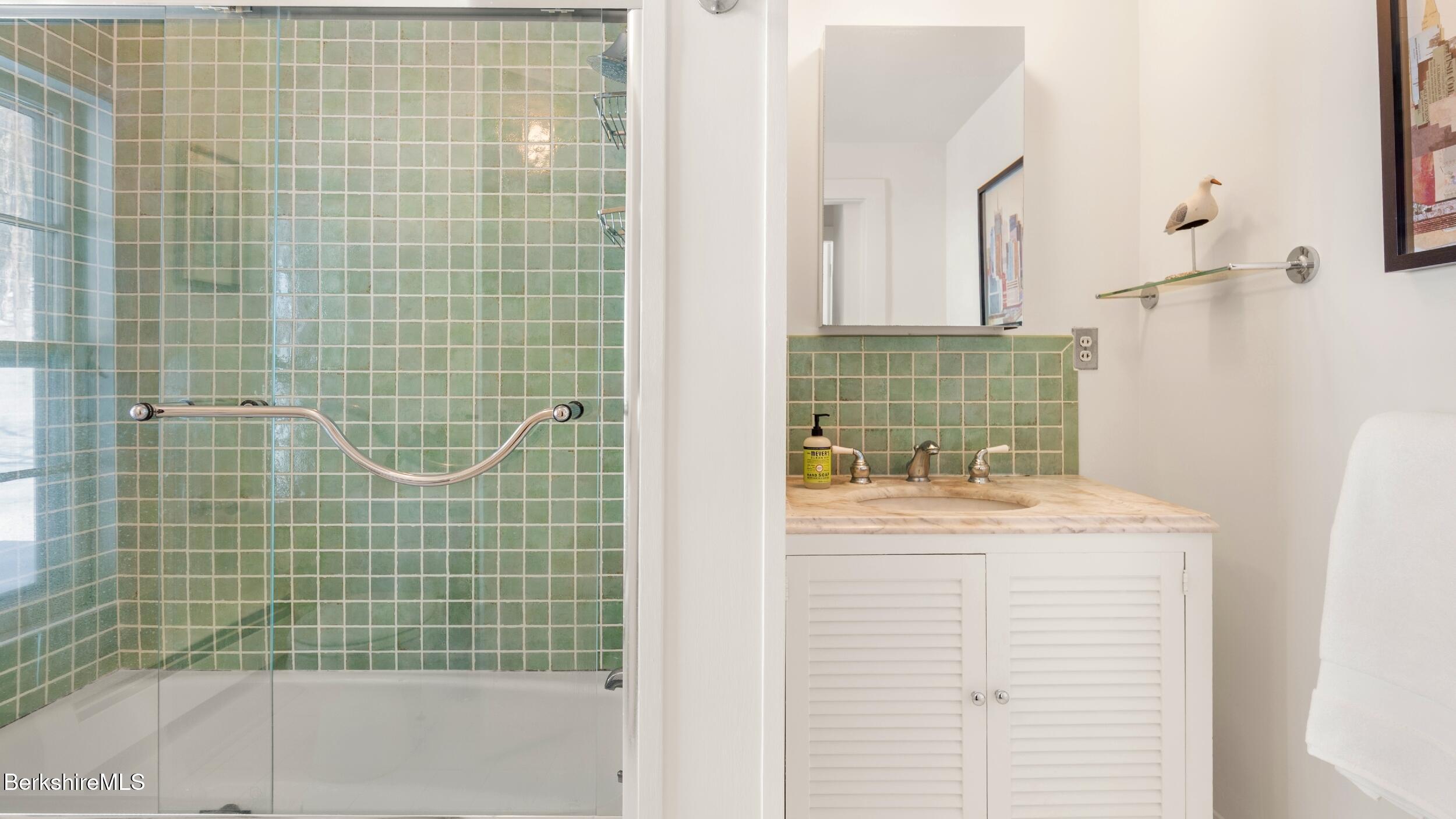 12 Alford Center Road Alford, MA 01266 - Photo 36 of 46 a bathroom with a sink a mirror and shower