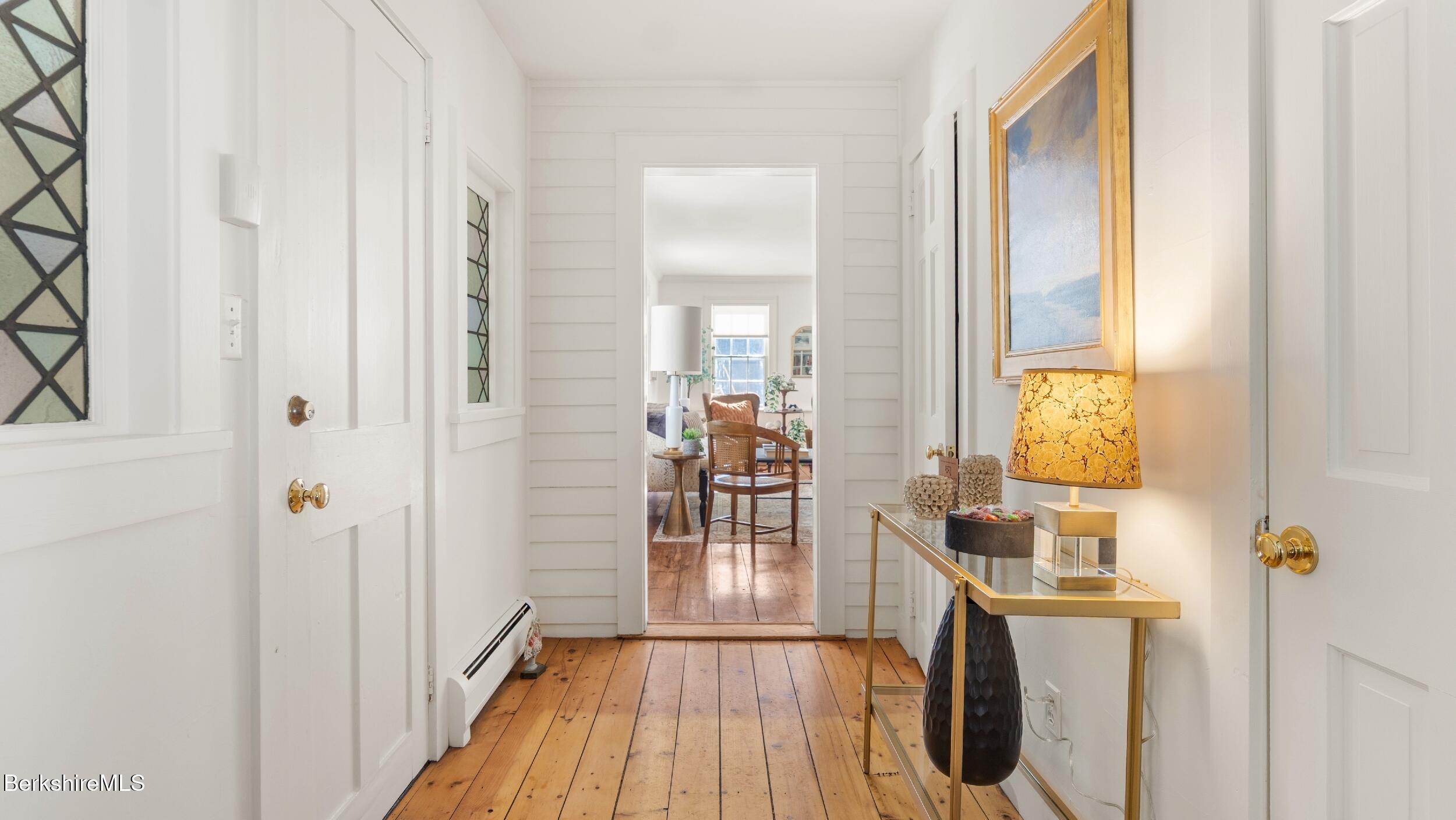 12 Alford Center Road Alford, MA 01266 - Photo 4 of 46 a view of a hallway with wooden floor and a bathroom