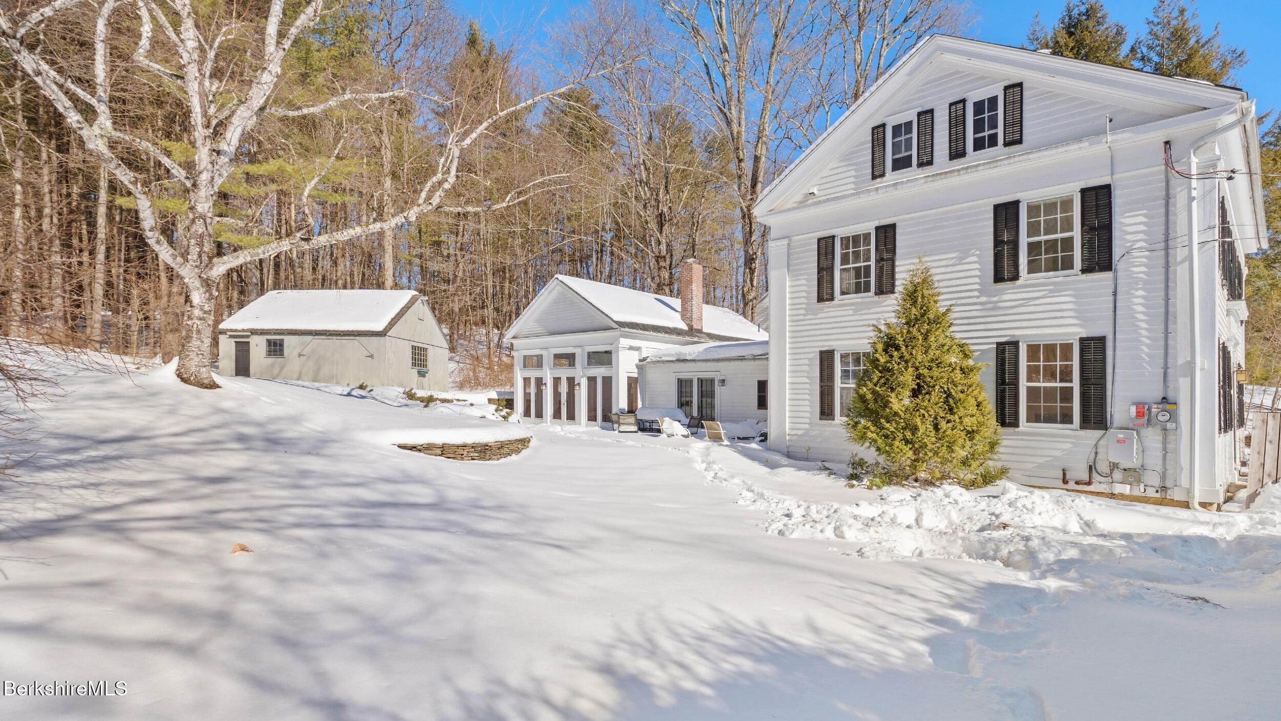 12 Alford Center Road Alford, MA 01266 - Photo 44 of 46 a view of a white house with yard and sitting area