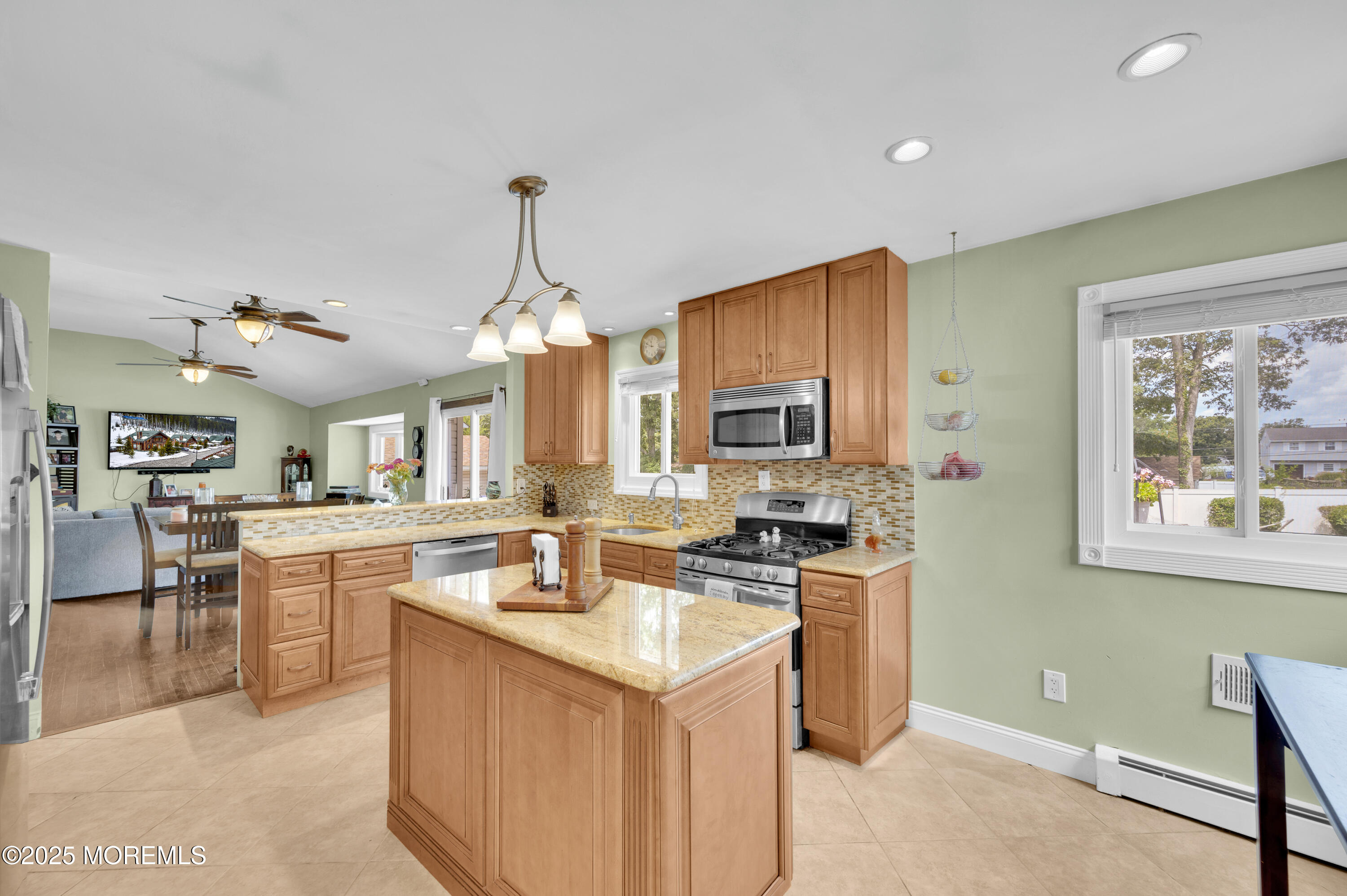 348 Hilltop Road Toms River, NJ 08753 - Photo 21 of 48 a kitchen that has a lot of cabinets in it and appliances