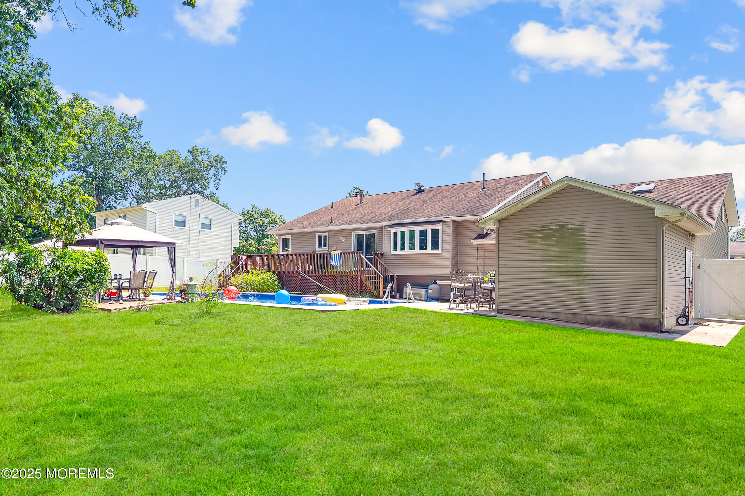348 Hilltop Road Toms River, NJ 08753 - Photo 36 of 48 a aerial view of a house with swimming pool garden view and a garden