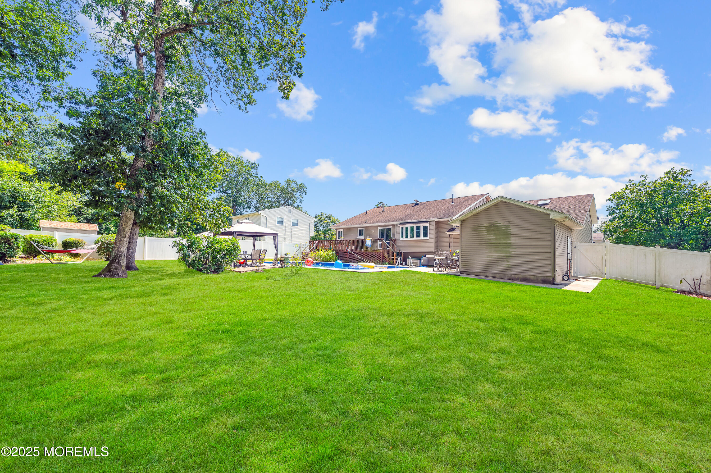 348 Hilltop Road Toms River, NJ 08753 - Photo 41 of 48 a view of a house with backyard and garden