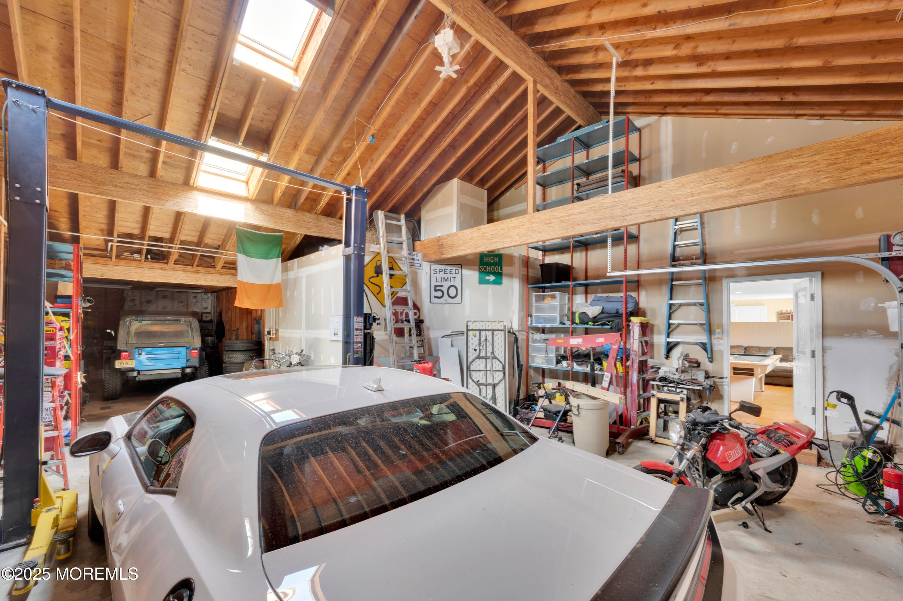 348 Hilltop Road Toms River, NJ 08753 - Photo 43 of 48 a bedroom with bed and a chandelier