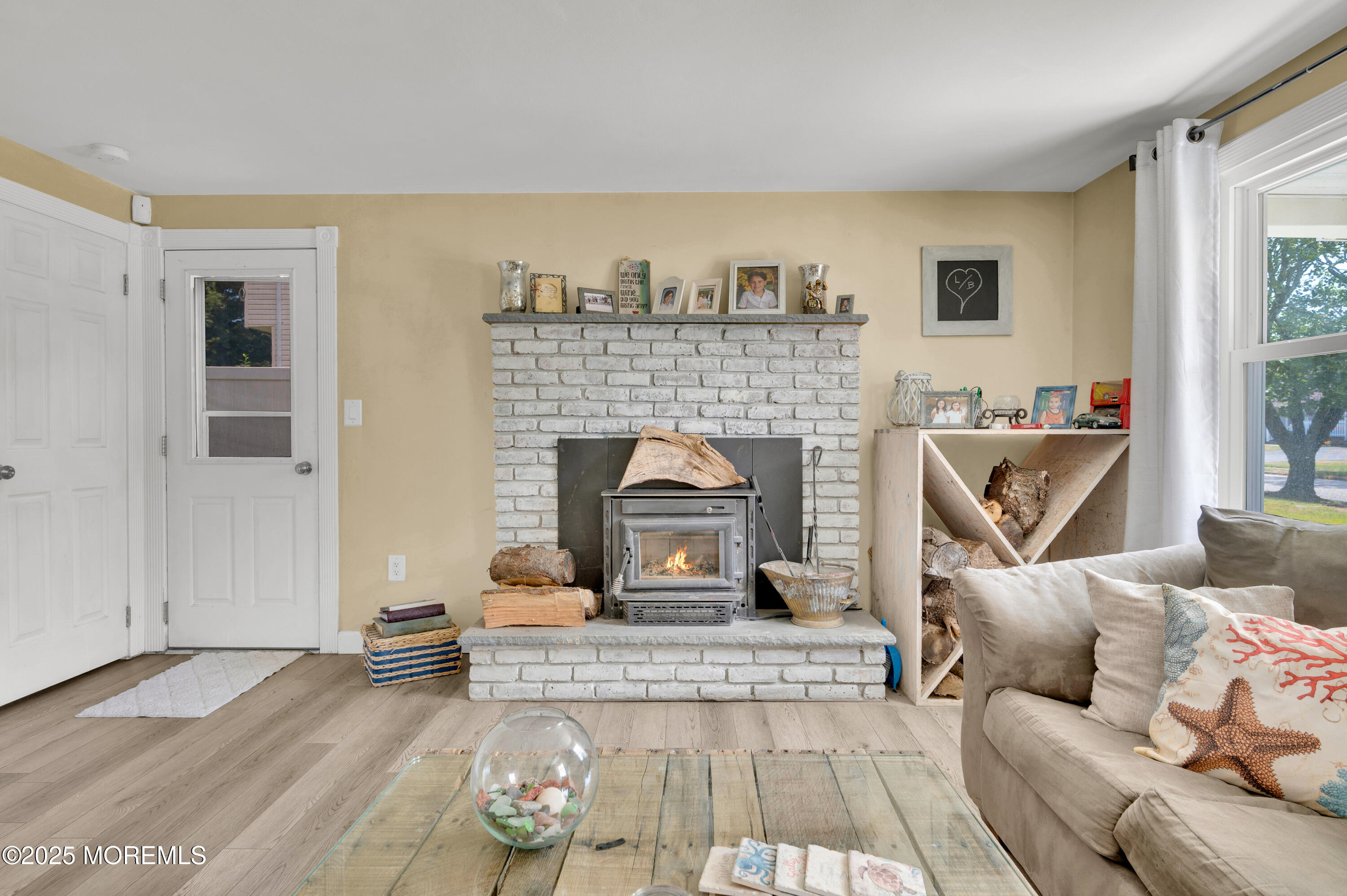 348 Hilltop Road Toms River, NJ 08753 - Photo 7 of 48 a living room with furniture and a fireplace
