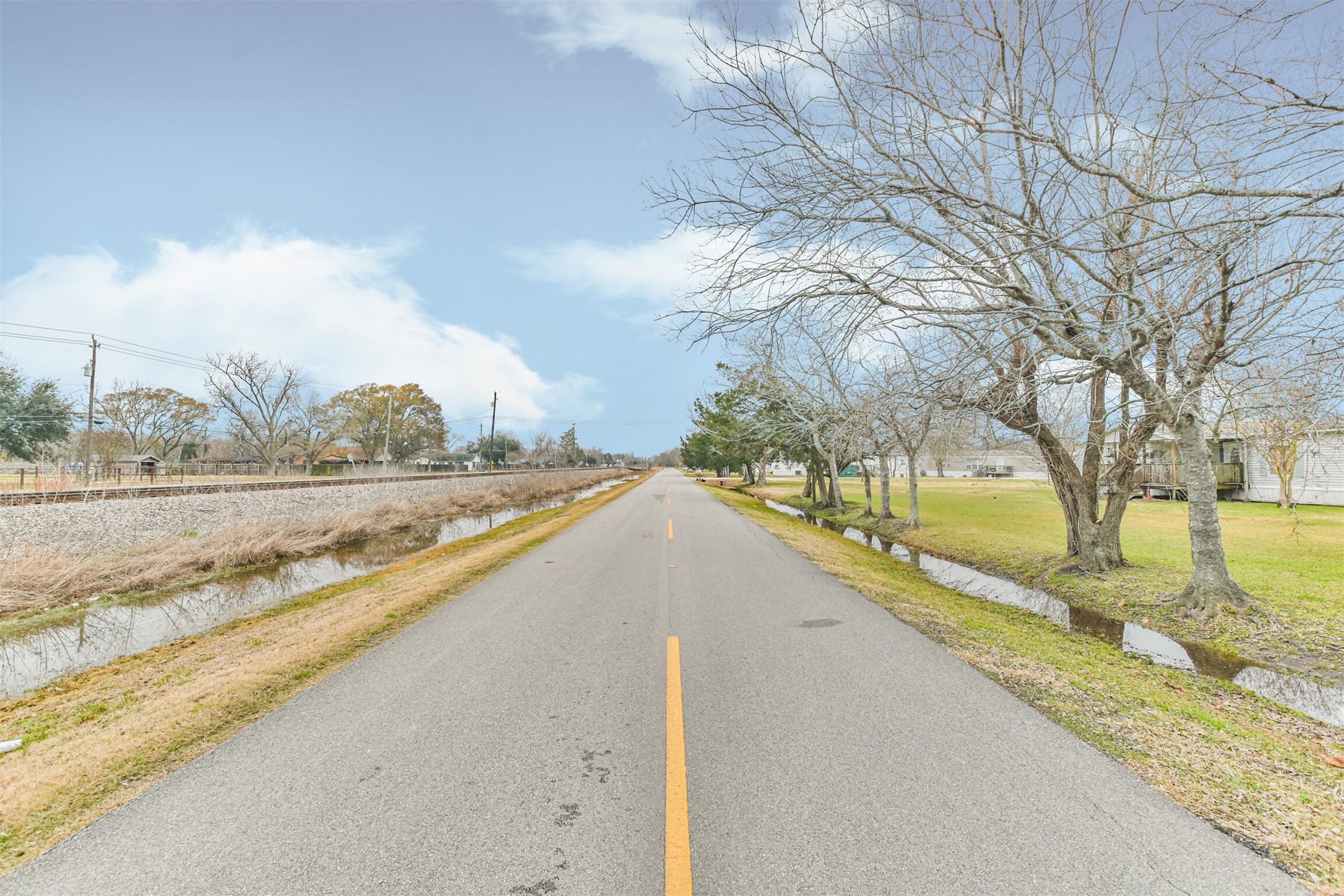 1300 North Battlebell Road Highlands, TX 77562 - Photo 12 of 16 a view of swimming pool with a yard