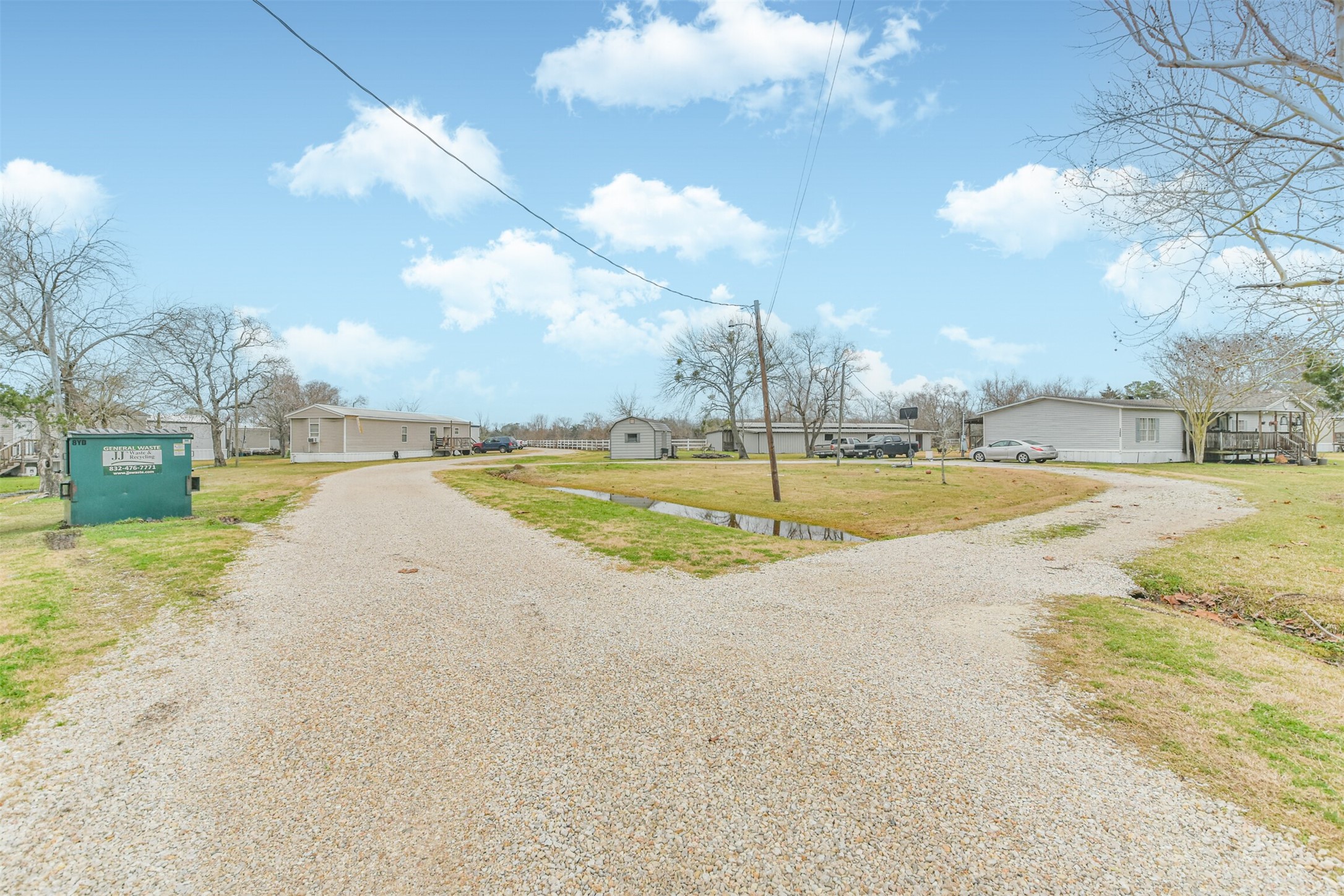 1300 North Battlebell Road Highlands, TX 77562 - Photo 13 of 16 a view of a swimming pool with an outdoor space and seating area