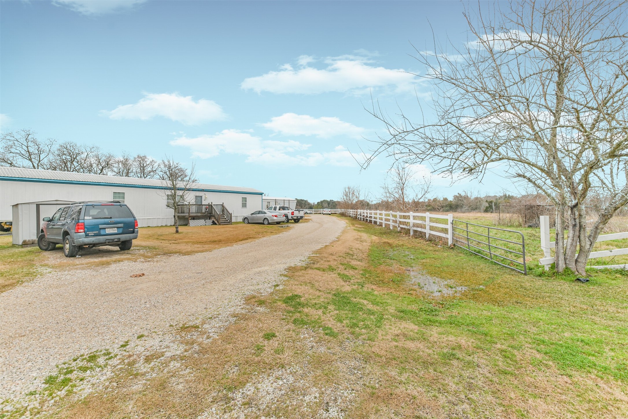 1300 North Battlebell Road Highlands, TX 77562 - Photo 14 of 16 a view of residential houses with yard and swimming pool