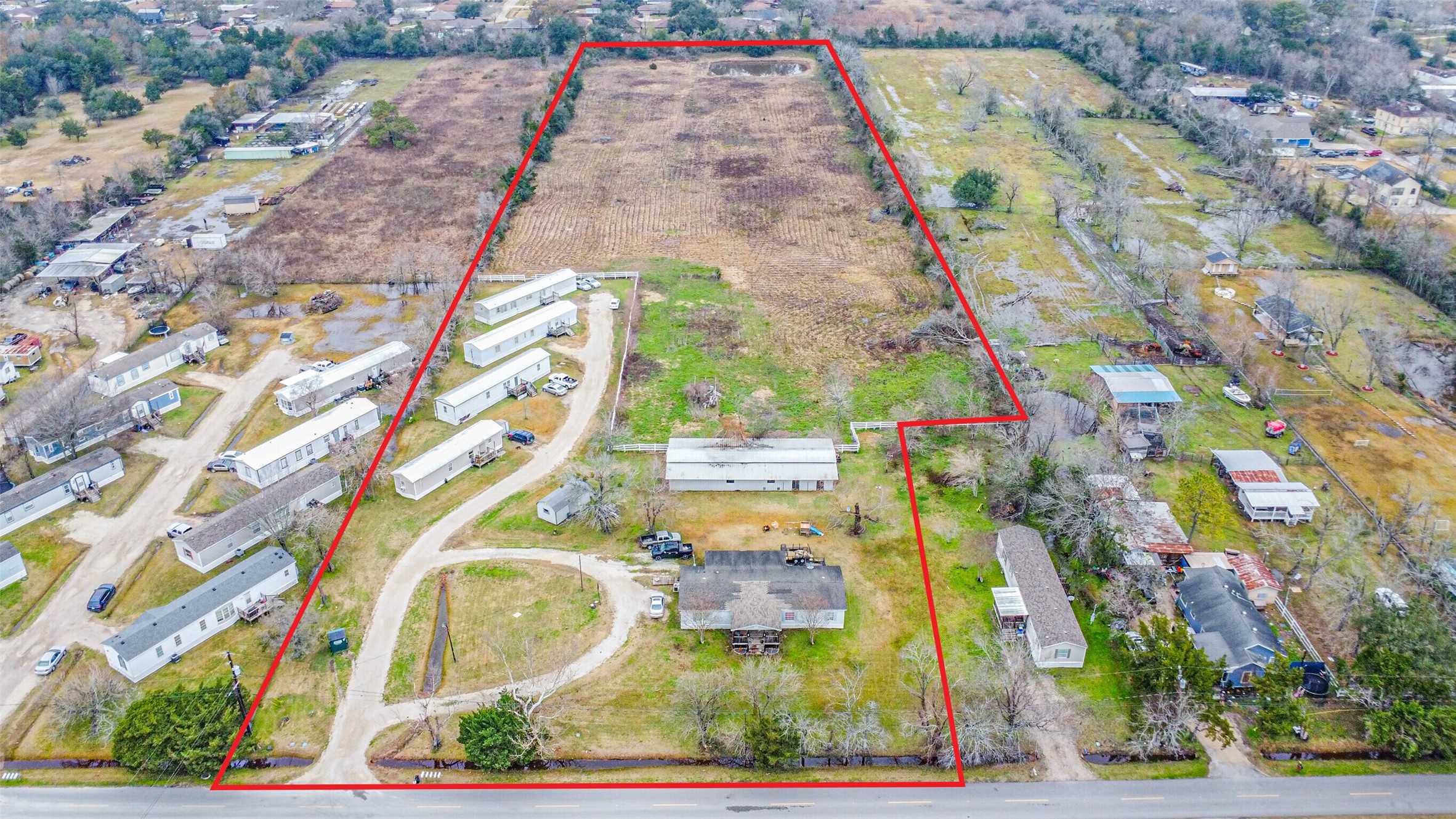 1300 North Battlebell Road Highlands, TX 77562 - Photo 3 of 16 a view of a multi story building