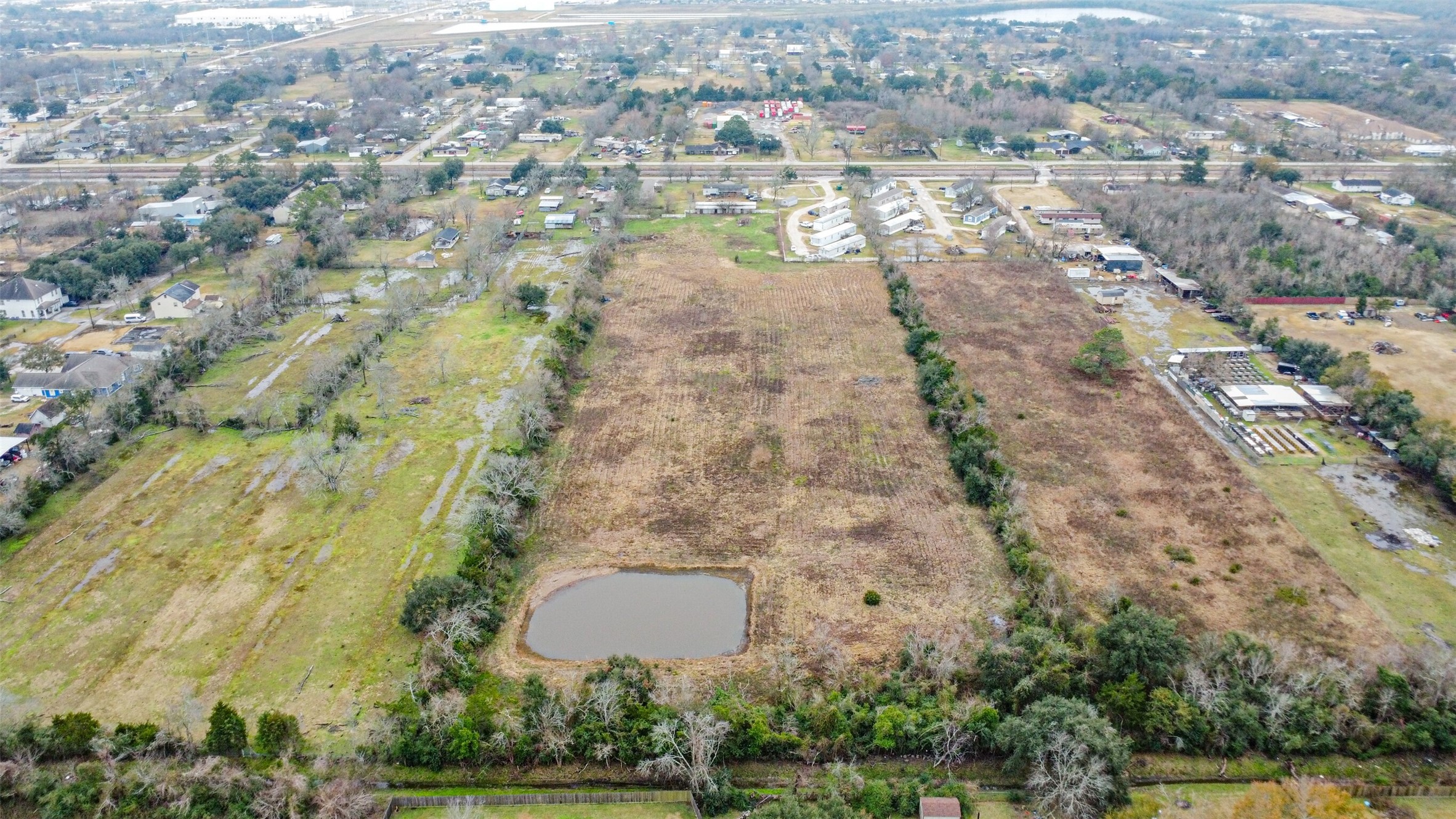 1300 North Battlebell Road Highlands, TX 77562 - Photo 6 of 16 an aerial view of residential house with outdoor space