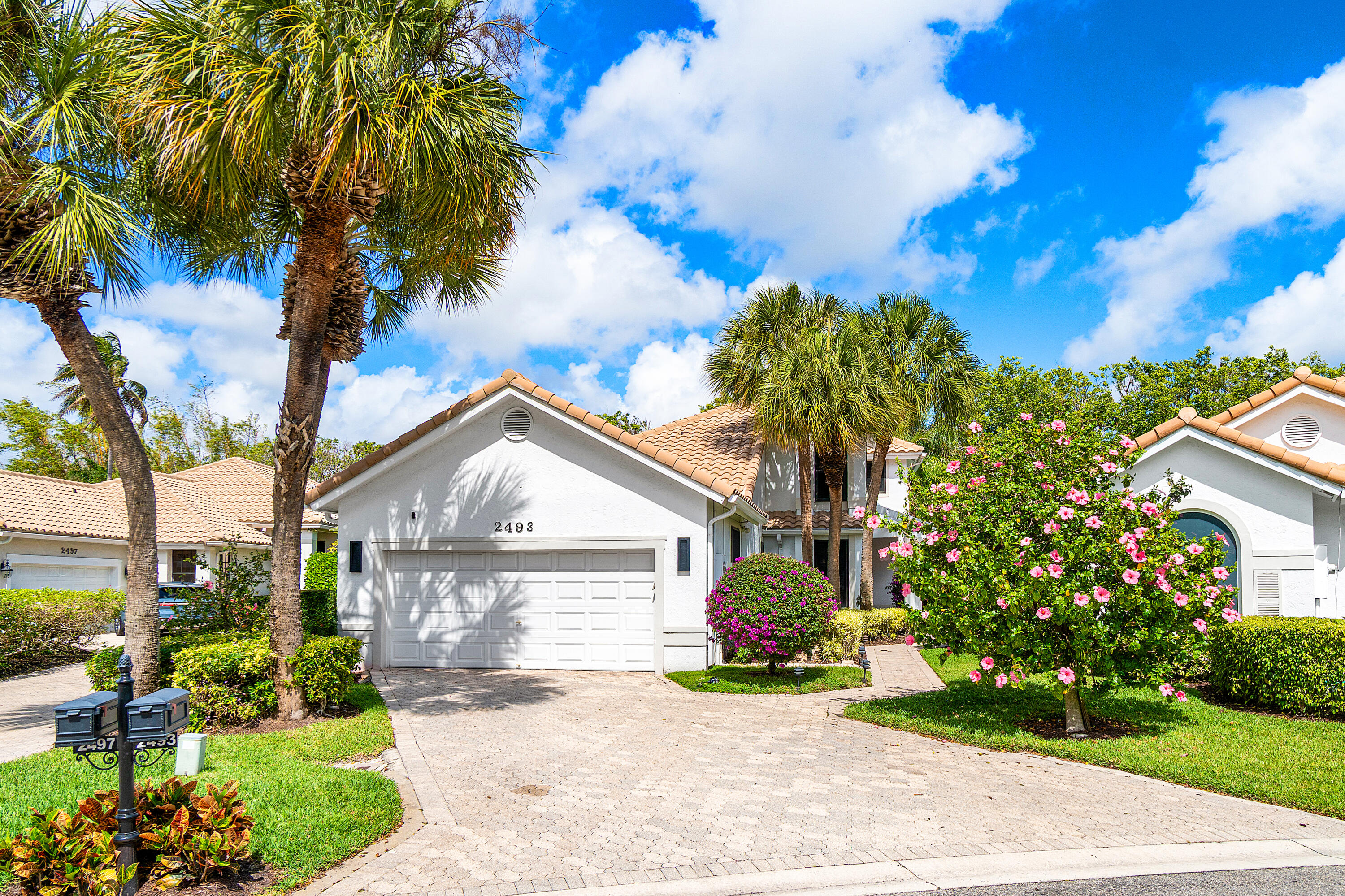 2493 Northwest 64th Street Boca Raton, FL 33496 - Photo 1 of 29 Exterior Front