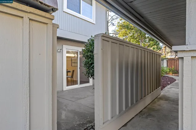 a view of a house with porch and wooden floor