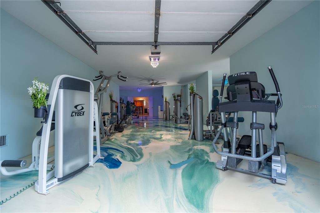 6060 Manasota Key Road Englewood, FL 34223 - Photo 11 of 54 a view of a room with gym equipment