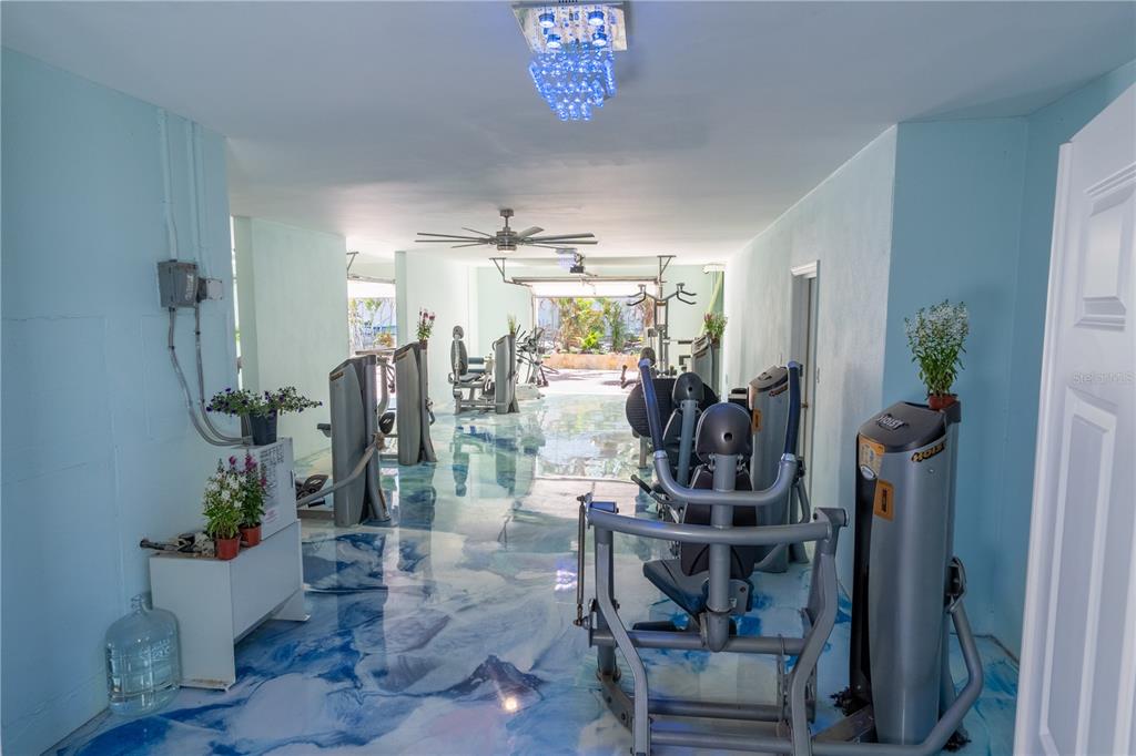 6060 Manasota Key Road Englewood, FL 34223 - Photo 12 of 54 a view of a room with gym equipment