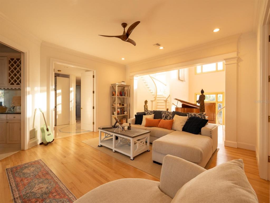 6060 Manasota Key Road Englewood, FL 34223 - Photo 18 of 54 a living room with furniture and a large window