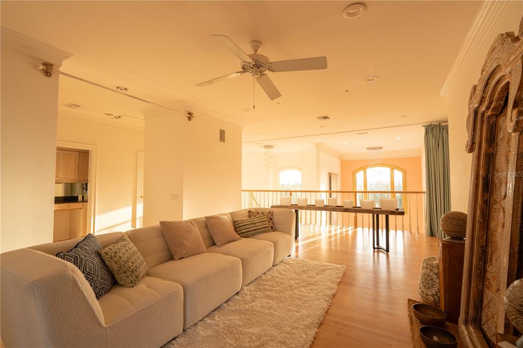 6060 Manasota Key Road Englewood, FL 34223 - Photo 27 of 54 a living room with furniture and a large window