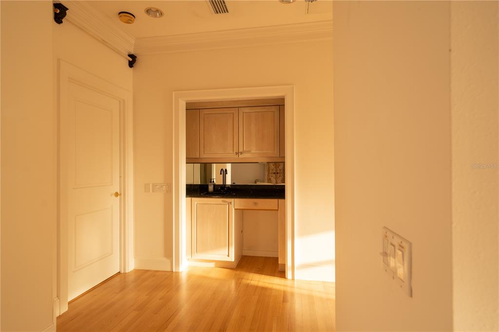 6060 Manasota Key Road Englewood, FL 34223 - Photo 28 of 54 a view of a bathroom from a hallway
