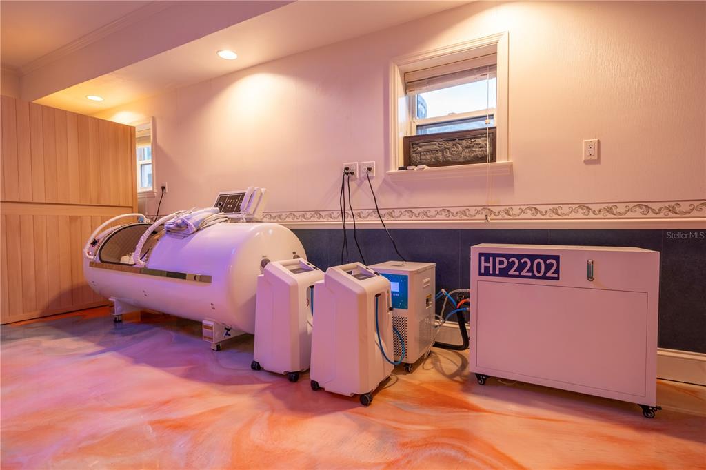 6060 Manasota Key Road Englewood, FL 34223 - Photo 43 of 54 a bed room with a bed and a night stand