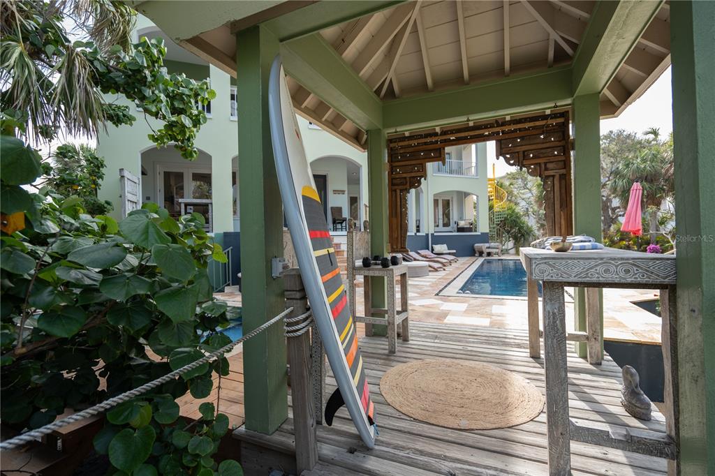 6060 Manasota Key Road Englewood, FL 34223 - Photo 48 of 54 a view of a house with porch and furniture
