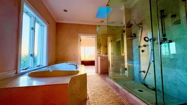 a bed room with a bed and a window