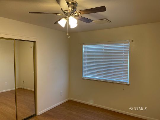201 Kimberly Lane Ridgecrest, CA 93555 - Photo 6 of 10 a view of an empty room with a window