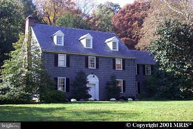 a brick building with a yard