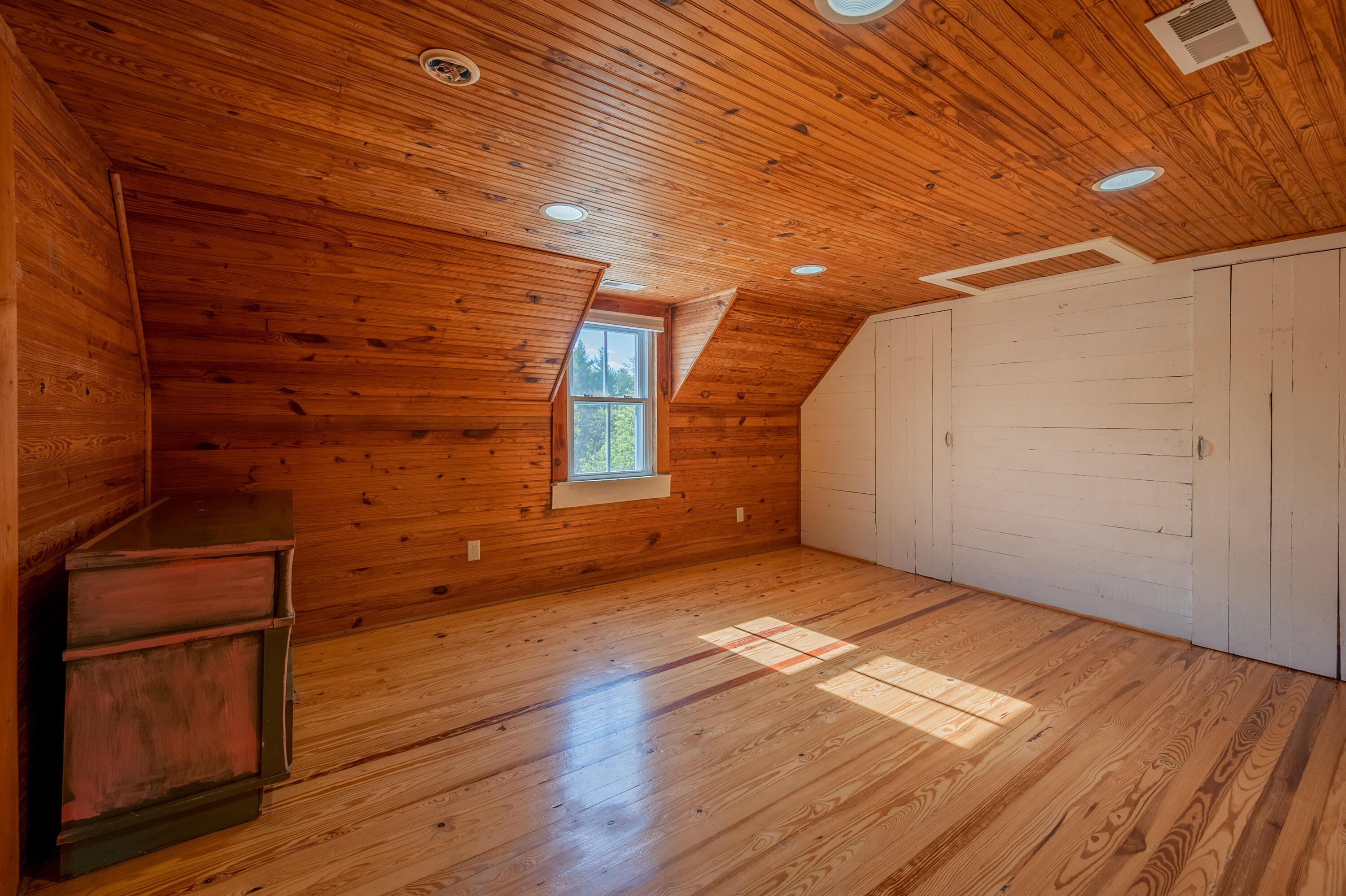 2012 Stonewall Road Northeast Check, VA 24072 - Photo 50 of 83 a view of an empty room with wooden floor and a window