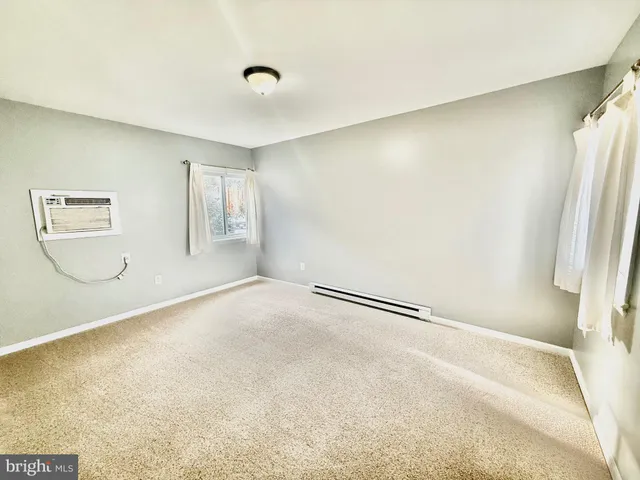 a view of a room with windows