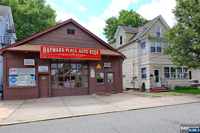 a view of a house with garage