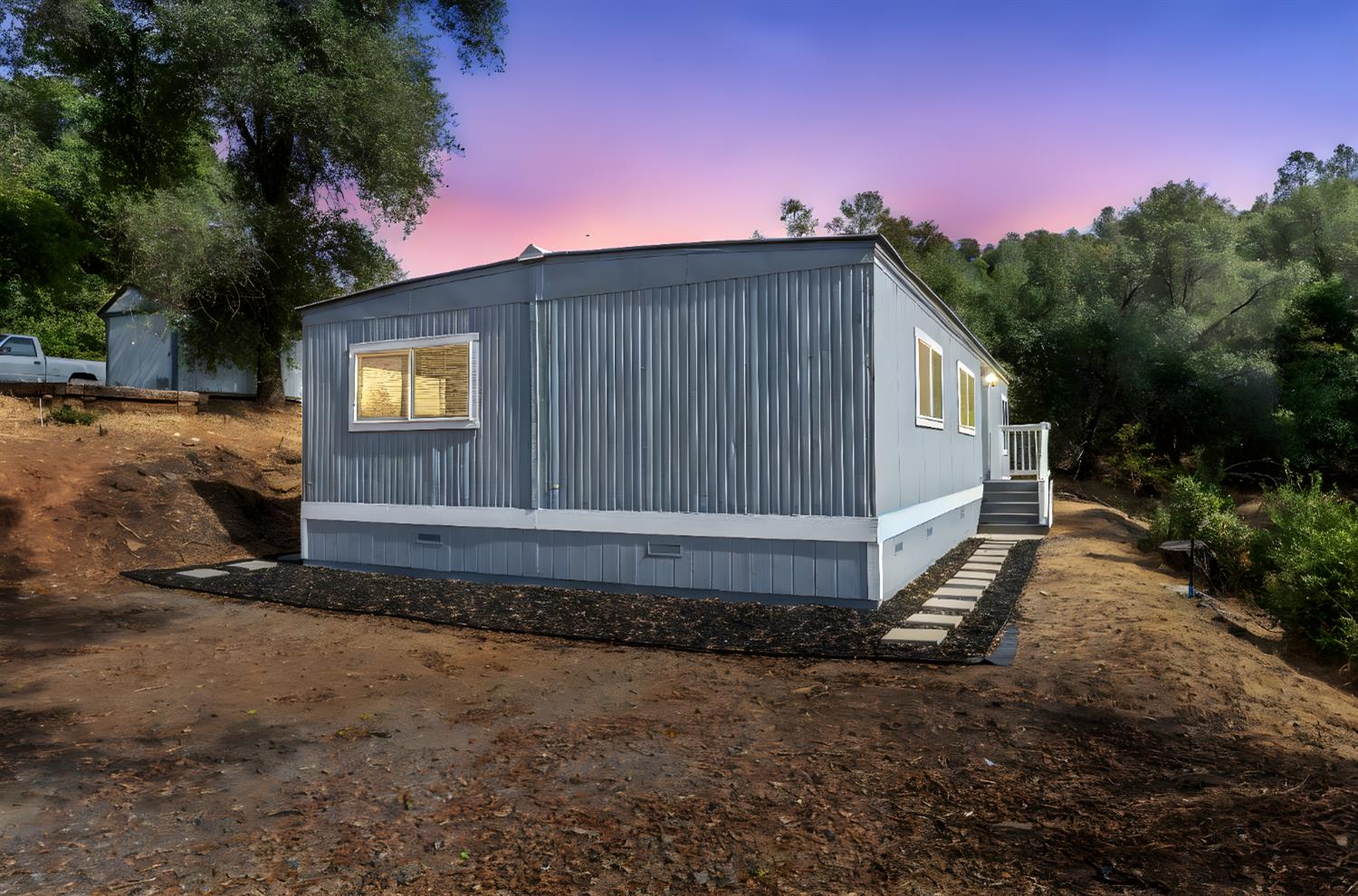 10155 Peppermint Circle, Unit 35 Jamestown, CA 95327 - Photo 1 of 27 a view of a house with backyard and garden