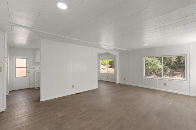 an empty room with windows