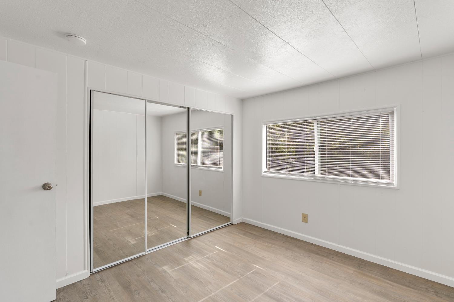 10155 Peppermint Circle, Unit 35 Jamestown, CA 95327 - Photo 18 of 27 a view of an empty room with a window